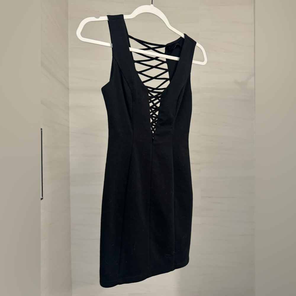 Small black mini dress with sexy cross cross